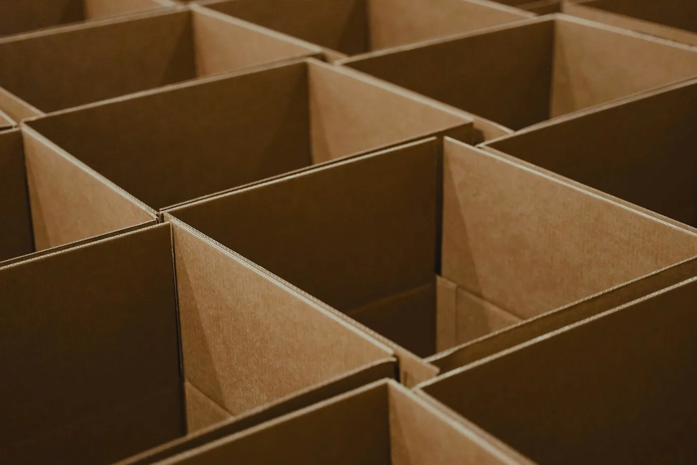 Open brown cardboard boxes arranged together